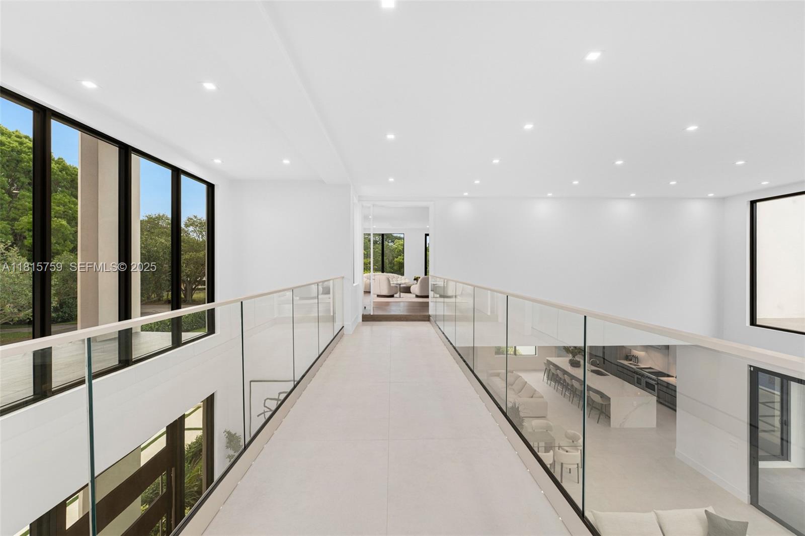 6200 Moss Ranch Road Pinecrest, FL 33156 - Photo 26 of 58 a view of a hallway with the view and staircase