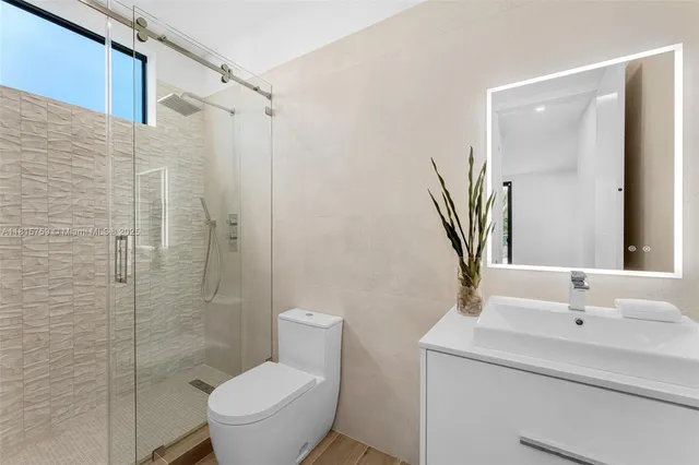 a house with palm tree in front of it