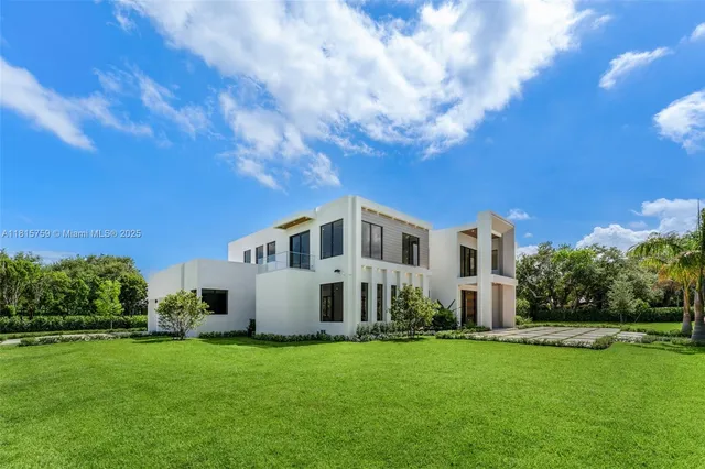 a view of swimming pool with outdoor seating