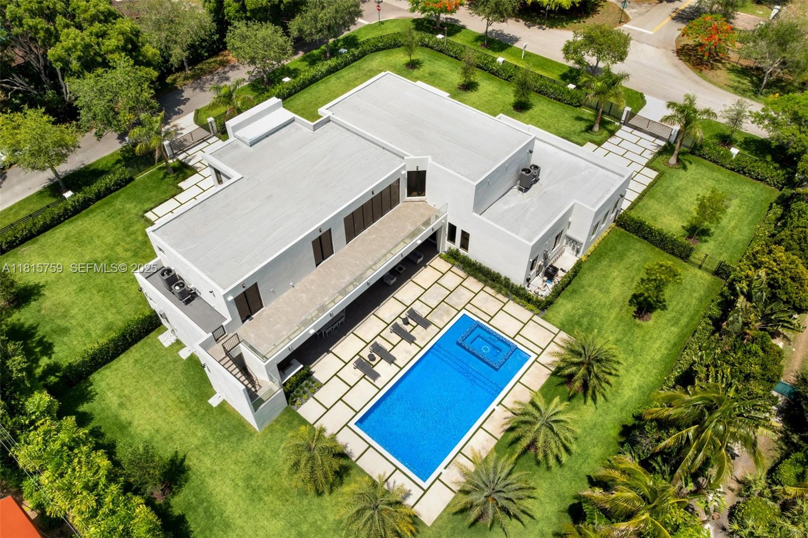 6200 Moss Ranch Road Pinecrest, FL 33156 - Photo 47 of 58 an aerial view of a house