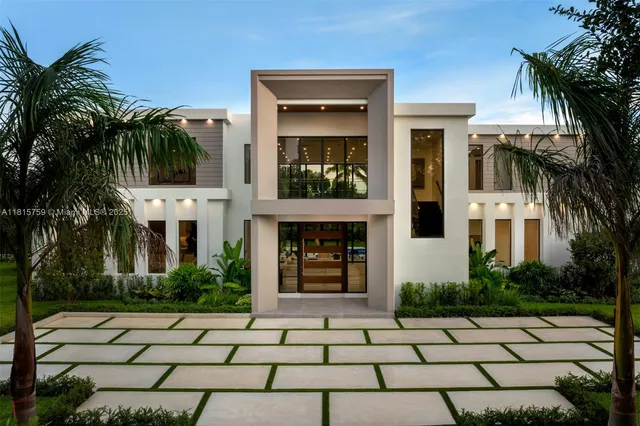 an aerial view of a house with a garden
