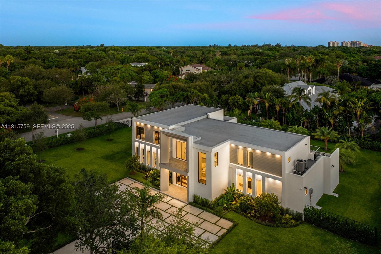 6200 Moss Ranch Road Pinecrest, FL 33156 - Photo 58 of 58 an aerial view of a house with a garden