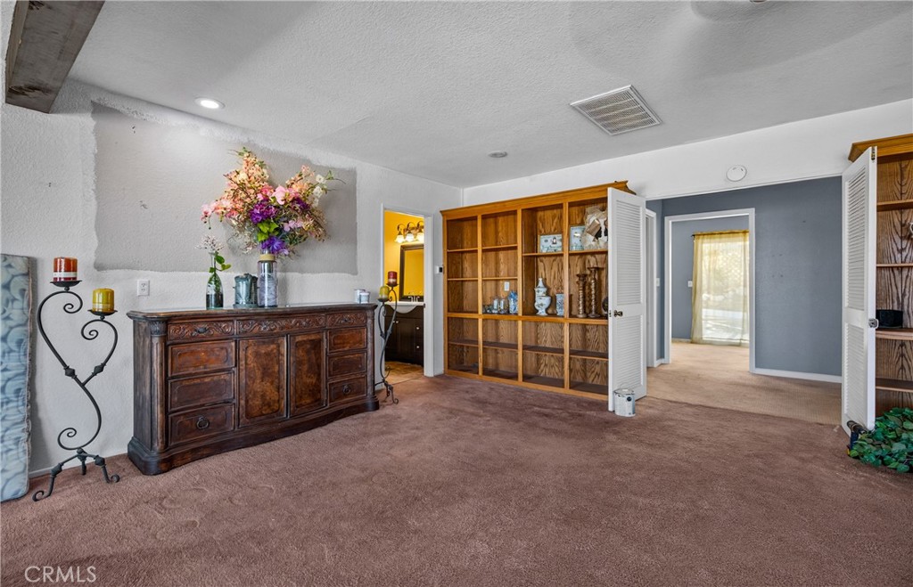 8929 Central Road Apple Valley, CA 92308 - Photo 10 of 43 Front Living Room. Powder Room is adjacent to this room.