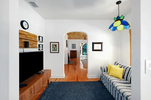 a dining room with a table and chairs