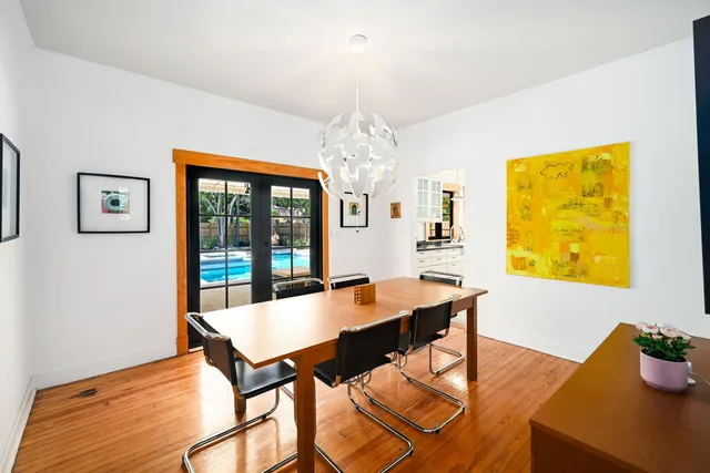 a large kitchen with stainless steel appliances granite countertop a stove and cabinets