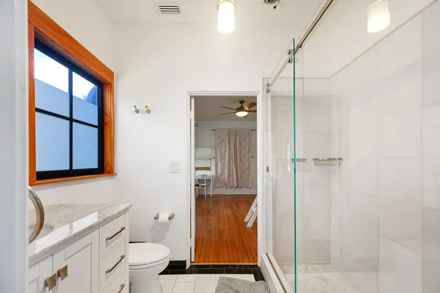 a view of a livingroom with furniture and window