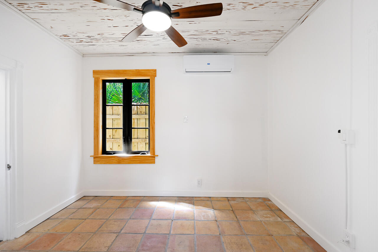 801 Hibiscus Street Boca Raton, FL 33486 - Photo 48 of 60 a view of an empty room with a window