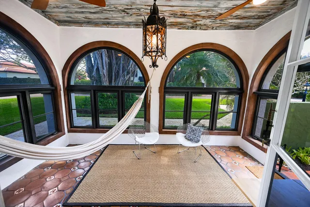 a view of swimming pool with a porch