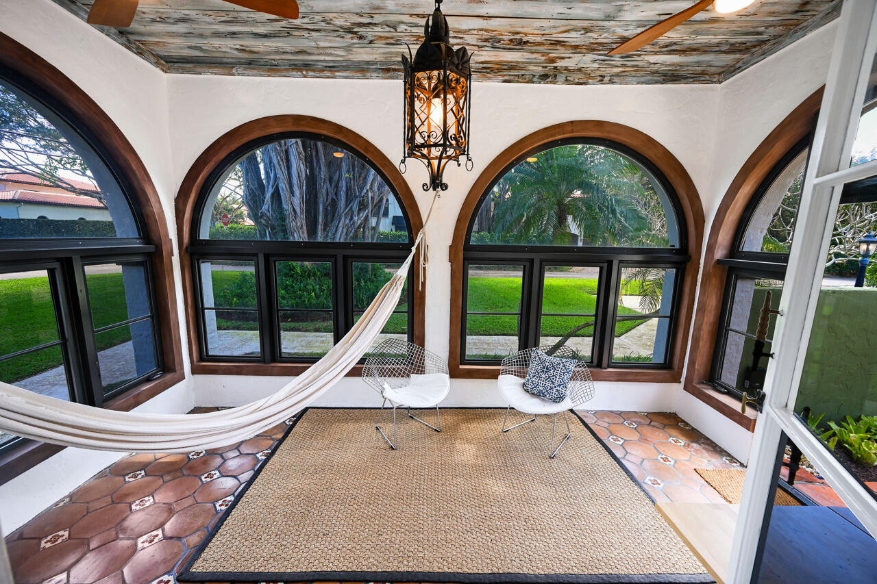 801 Hibiscus Street Boca Raton, FL 33486 - Photo 7 of 60 a view of swimming pool with a porch