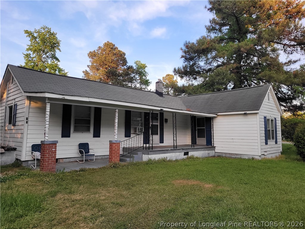 39 Durant Road Wilson's Mills, NC 27527 - Photo 2 of 11 a front view of house with yard