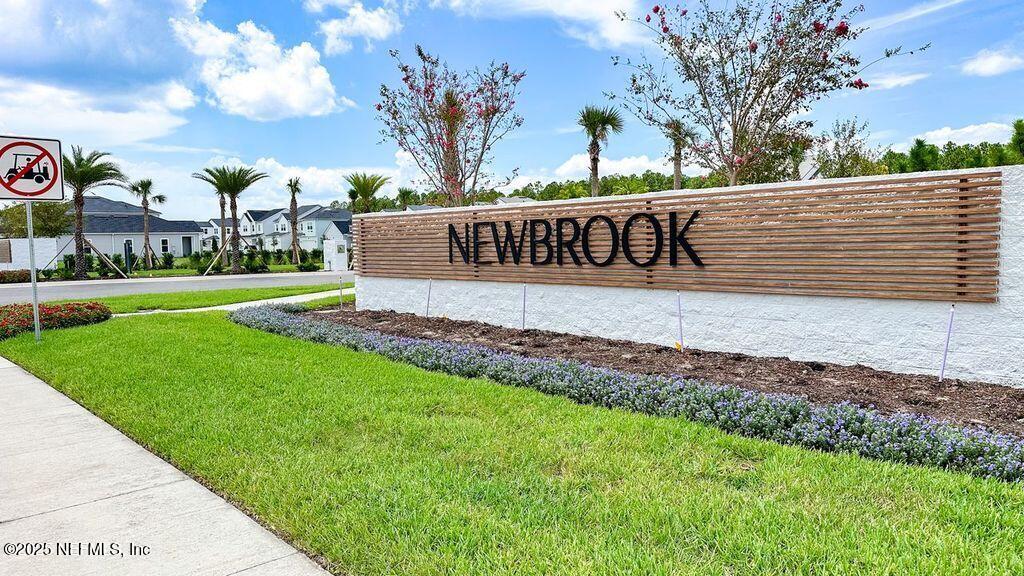 92 Bedford Terrace, Unit 60 St. Augustine, FL 32092 - Photo 32 of 42 a view of a house with a yard