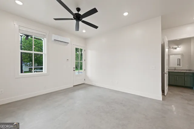 a view of workspace with furniture and window