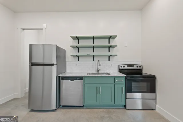 a bathroom with a toilet a sink and a window