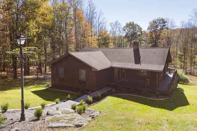 a view of a backyard of the house
