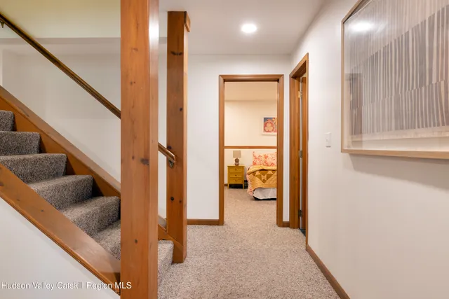 a living room with furniture a window and a table