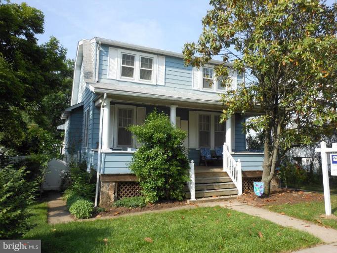 616 North Bend Road Baltimore, MD 21229 - Photo 1 of 18 front view of a house with a yard