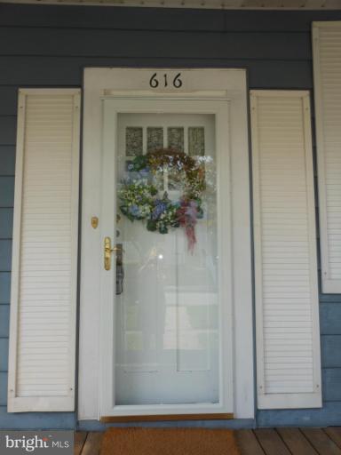 616 North Bend Road Baltimore, MD 21229 - Photo 17 of 18 a view of a wooden door