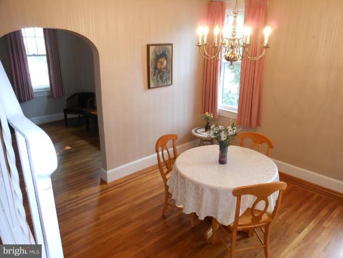 616 North Bend Road Baltimore, MD 21229 - Photo 3 of 18 a dining room with furniture and chandelier