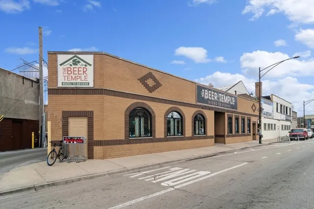 a view of a building with a street