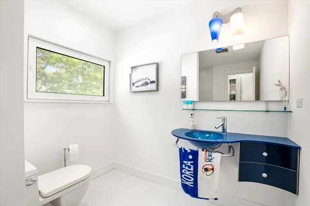a bathroom with a bathtub and a sink