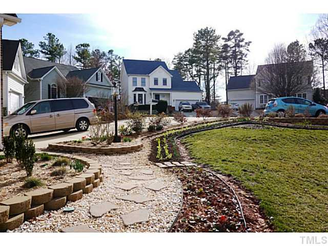 7008 Bellard Court Raleigh, NC 27617 - Photo 23 of 25 Combination of flower and vegetable garden!