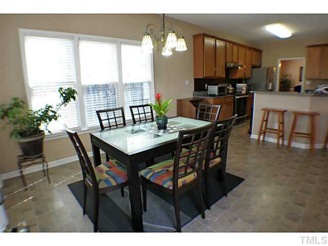 7008 Bellard Court Raleigh, NC 27617 - Photo 7 of 25 Sunny breakfast nook open to kitchen and family room!