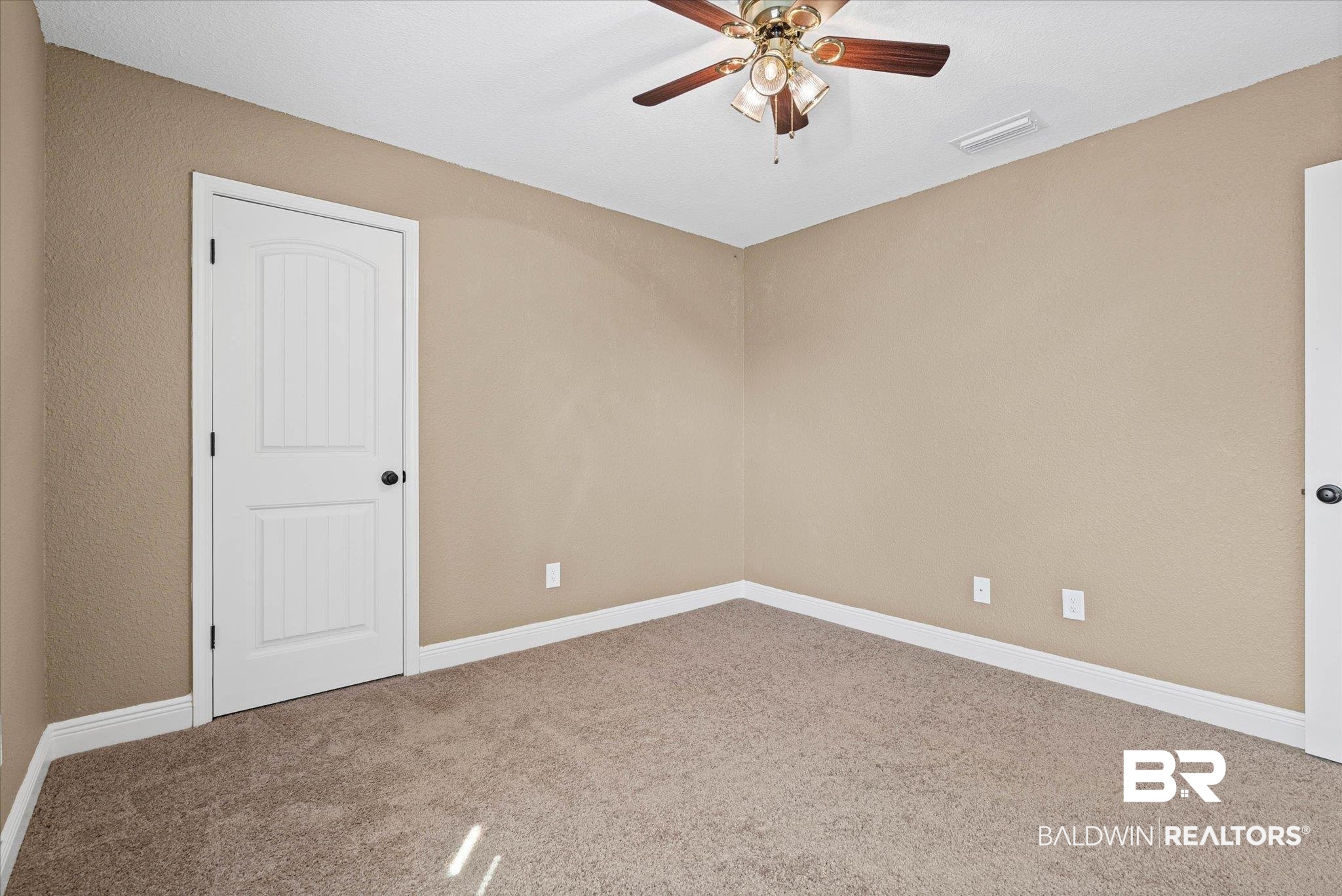 101 Washington Boulevard Foley, AL 36535 - Photo 18 of 32 Carpeted empty room featuring ceiling fan and baseboards