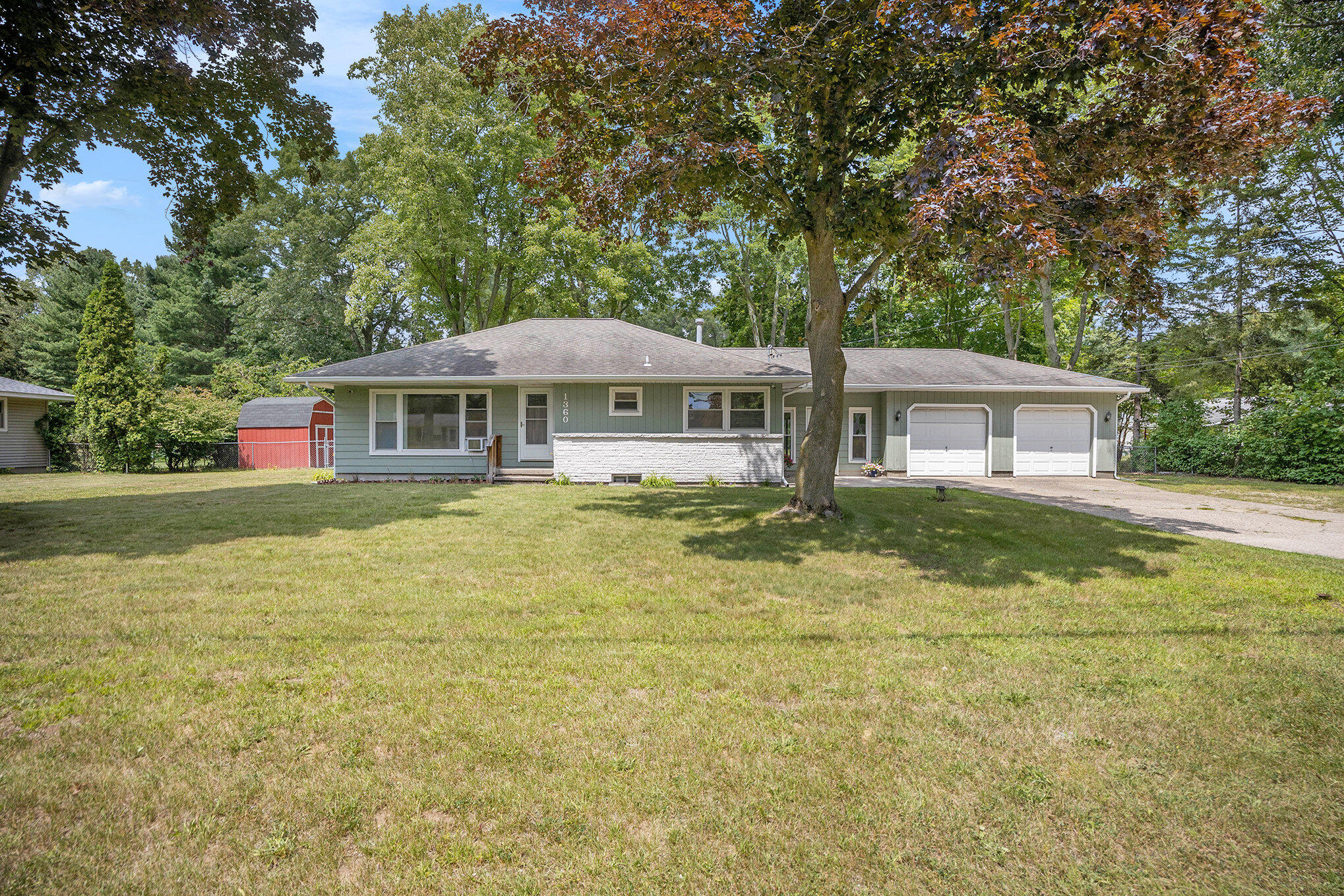 1360 Logan Road Muskegon, MI 49445 - Photo 1 of 32 Front