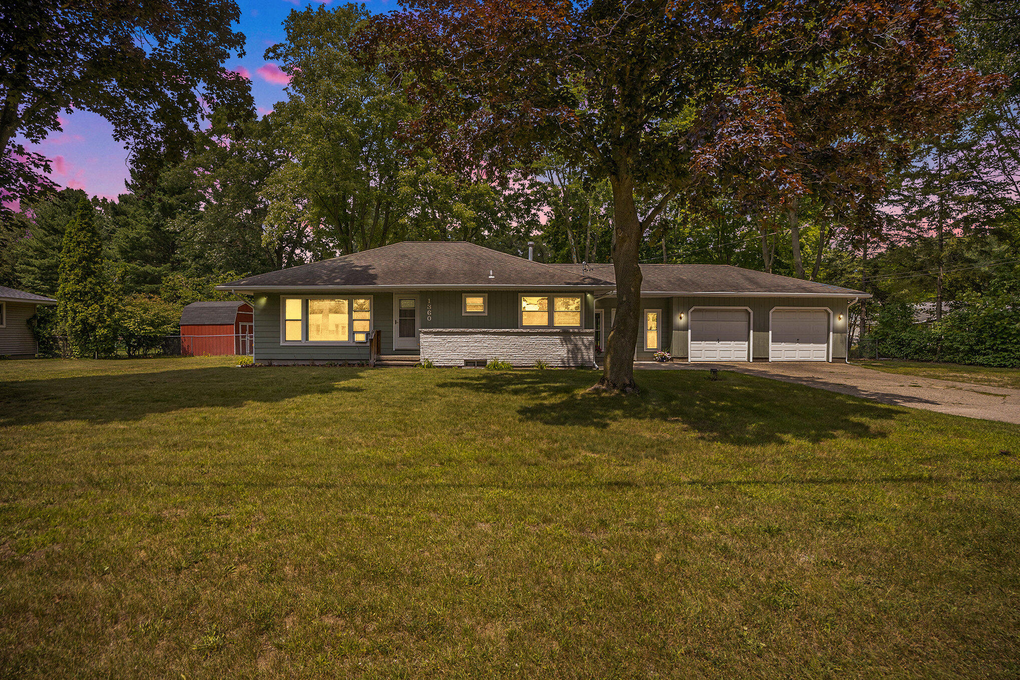 1360 Logan Road Muskegon, MI 49445 - Photo 2 of 32 001_1360_logan-53-twilight