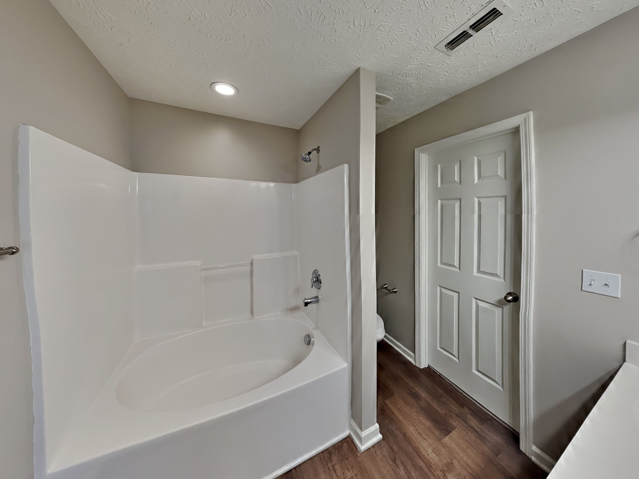 4049 Sequoia Trail Spring Hill, TN 37174 - Photo 9 of 15 a bathroom with a bathtub and a shower
