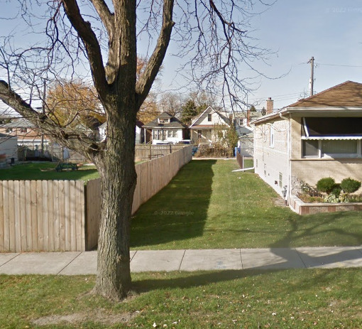 7330 South Wood Street Chicago, IL 60636 - Photo 1 of 1 a view of a yard with large tree