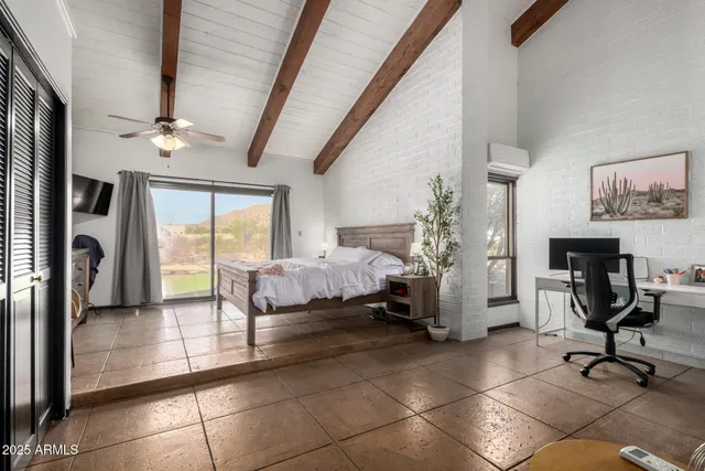 a living room with a couch and a stove