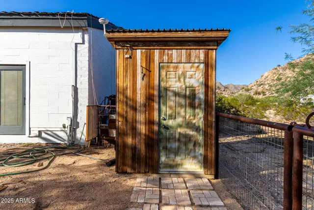 a living room with furniture a fireplace and a table