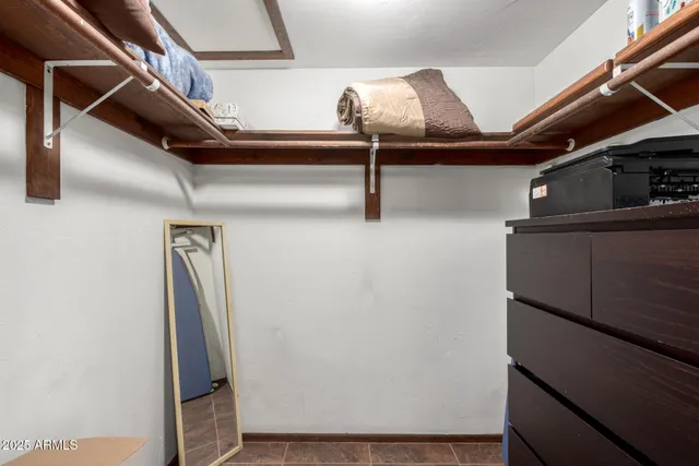 a view of a swimming pool with a lounge chairs