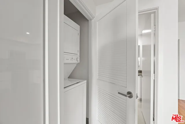 a bathroom with a granite countertop sink