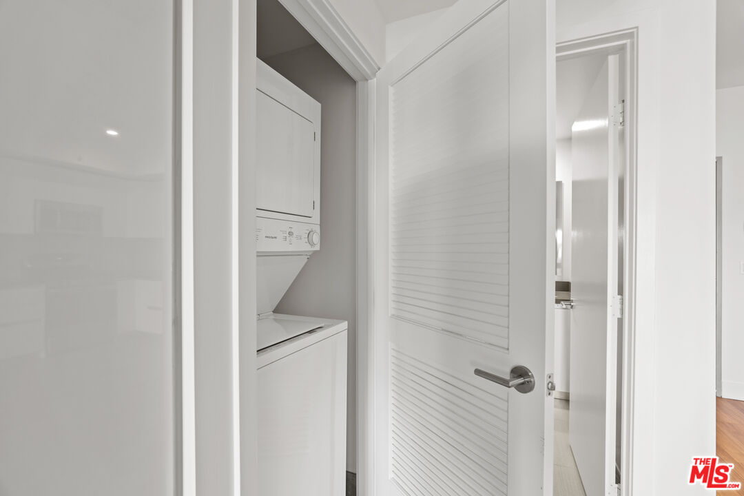 518 North Gramercy Place, Unit PH1 Los Angeles, CA 90004 - Photo 13 of 13 a bathroom with a granite countertop sink