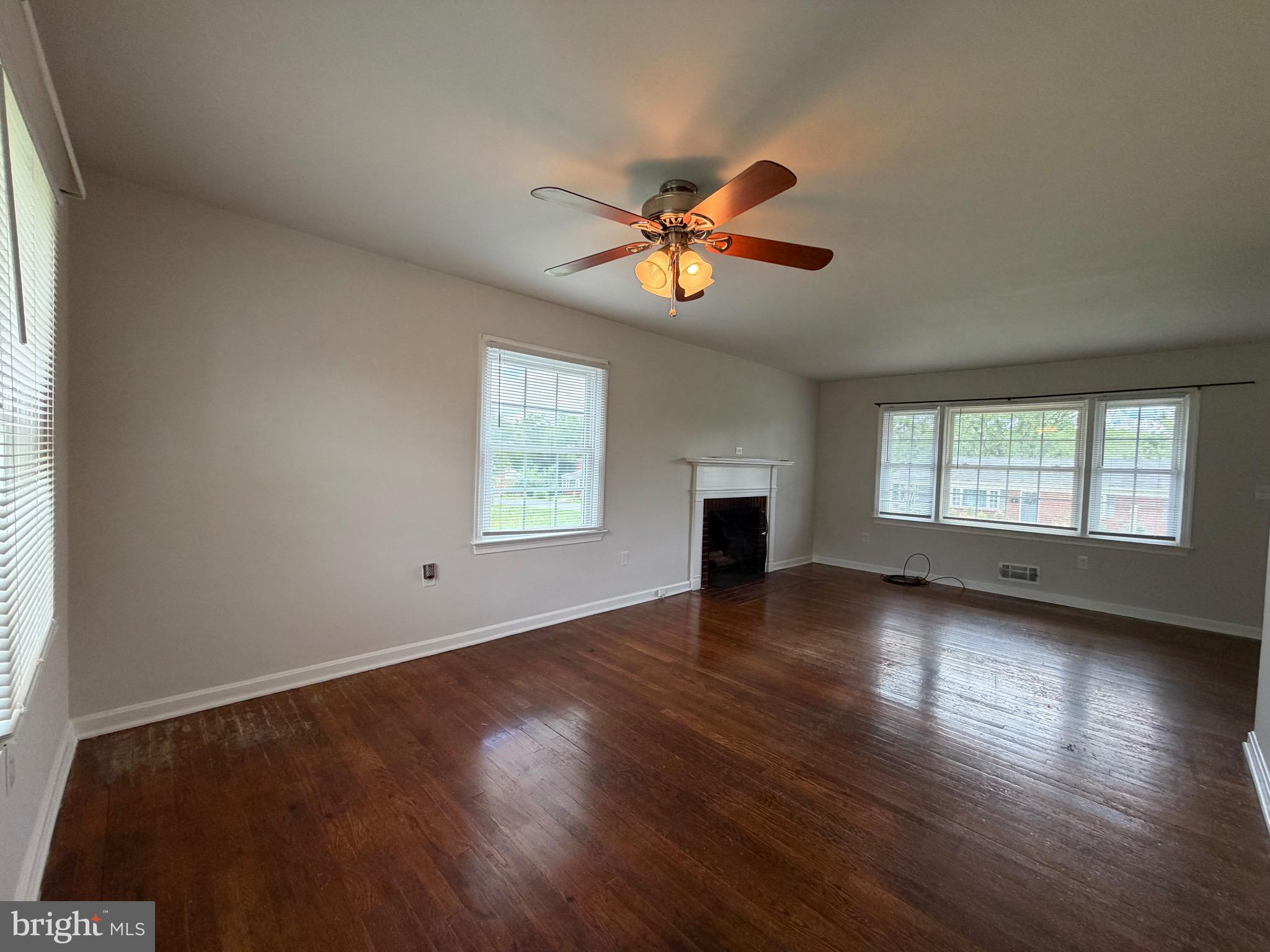 1010 Nottingham Street Culpeper, VA 22701 - Photo 15 of 21 a view of empty room with wooden floor and fan