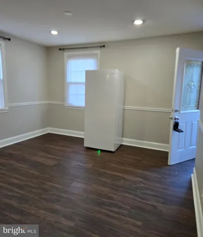 a bathroom with a toilet a sink and a bathtub