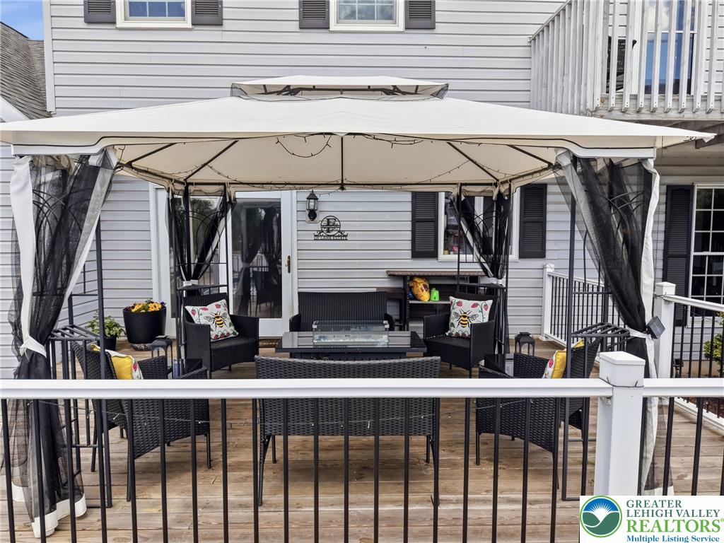 890 Lahr Road Nazareth, PA 18064 - Photo 56 of 71 An inviting deck with a canopy creates a comfortable outdoor living space.