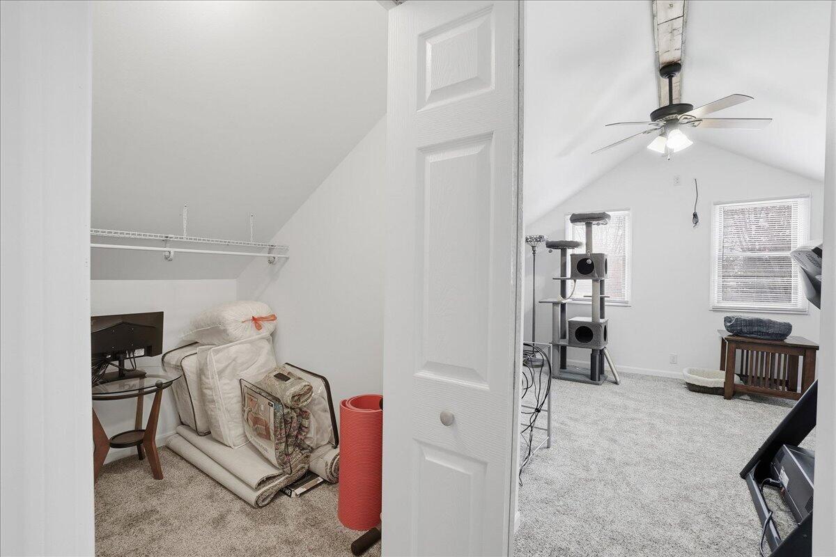 18311 Clark Street Lowell, IN 46356 - Photo 23 of 36 a view of a livingroom with furniture and a ceiling fan