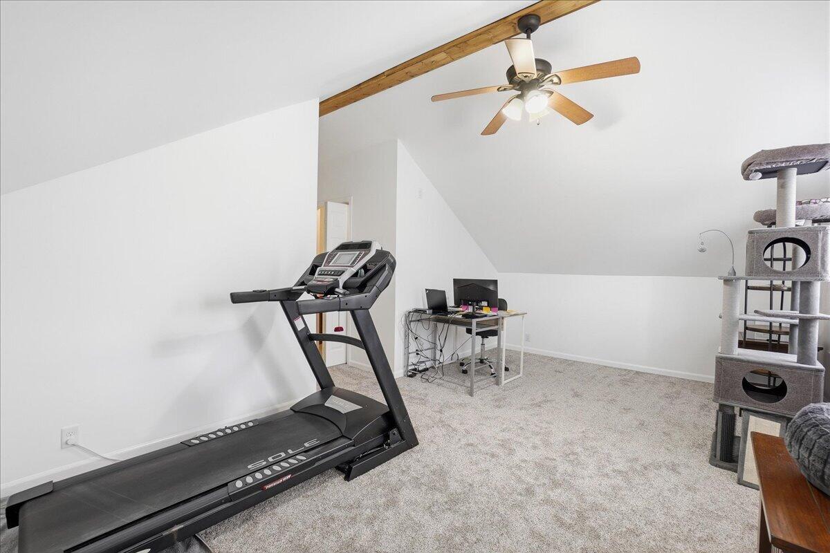 18311 Clark Street Lowell, IN 46356 - Photo 25 of 36 a room with gym equipment and windows