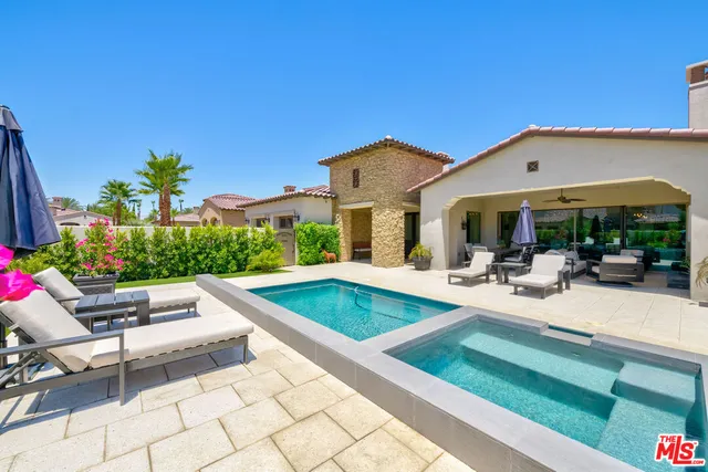 a view of a backyard with a patio