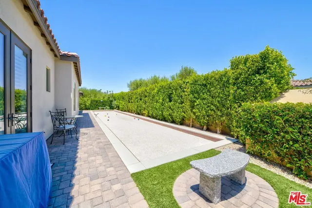 a kitchen with a sink cabinets and stove