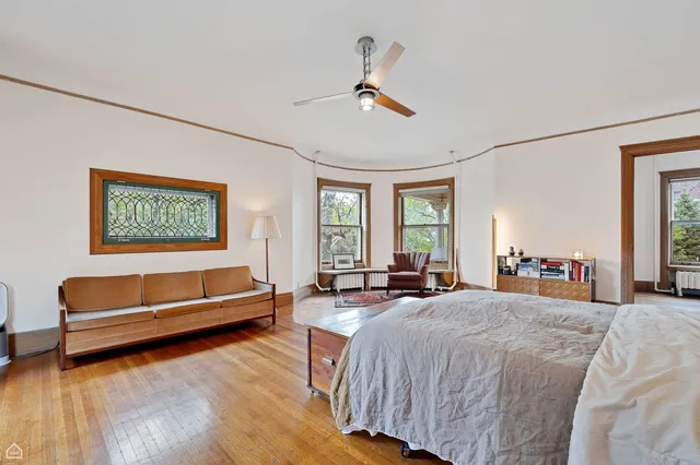 a bed room with a bed and a couch