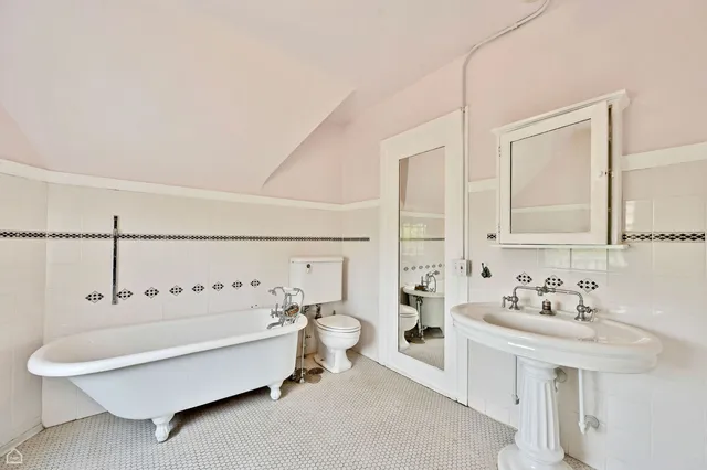 a bathroom with a sink and a bathtub
