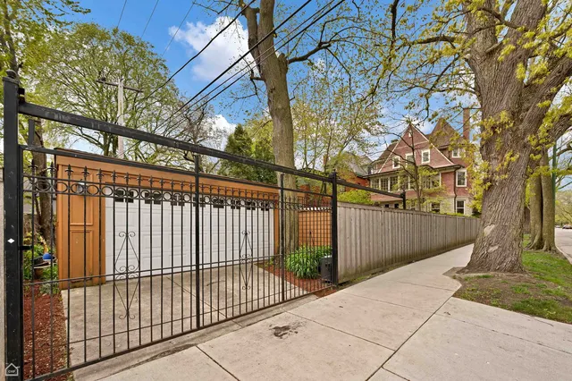 a view of a wrought iron fences in front of house