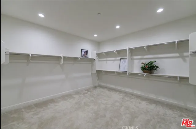 a bathroom with a toilet sink and shower