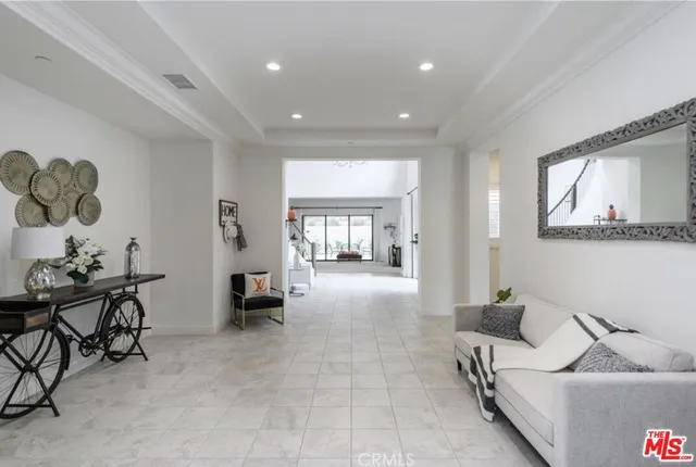 a living room with furniture and a couch