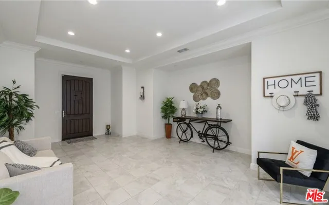 a view of a livingroom with furniture