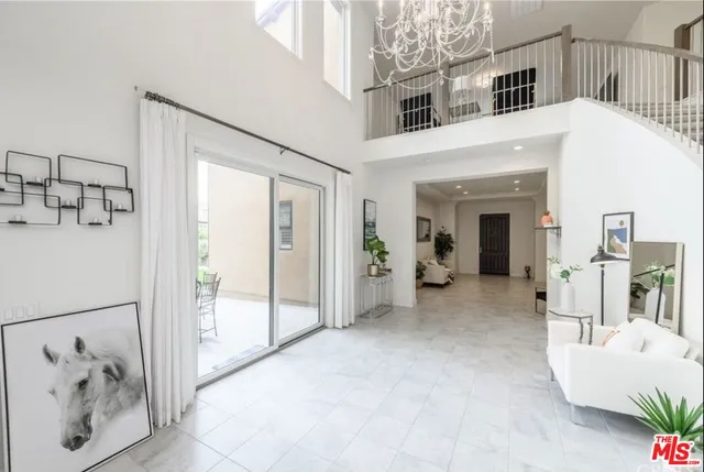 a view of livingroom with furniture and window